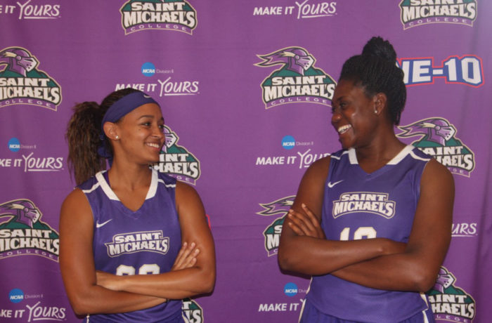 Indra Evora, '17, (left) and Tomi Akinpetide, '18, (right) share a smile during picture day before the start of the 2016-2017 season.