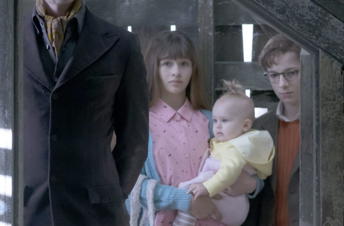 Pictured from left to right: Neil Patrick Harris as Count Olaf, Malina Weissman as Violet Baudelaire, Presley Smith as Sunny Baudelaire and Louis Hynes as Klaus Baudelaire. Photo courtesy of Netflix.