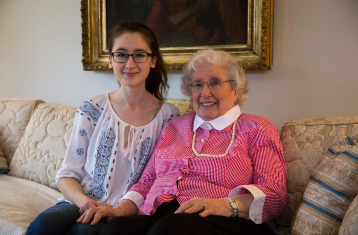 Julia Wagner, ’18,  (left) with Margaret “Peggy” Citarella at Citarella’s Burlington home on Tuesday. Citarella, a world war II welder, is the focus of Wagner’s research project. PHOTO BY LINDSEY GARLAND.
