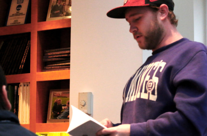 Peter Linn, '17, reads his peice on Jerry Collins