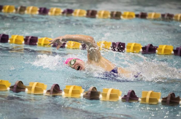 PHOTO COURTESY OF JAMES BUCK
Patty Kohn ’19, one of the team’s long distance swimmers, competes to beat her personal record of 18 minutes 22 seconds in the mile swim.