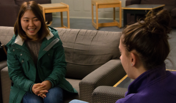 Iwasawa Nanaka talks with her conversation partner Emma Shortall for the first time. (Photo by Devin Imperati)